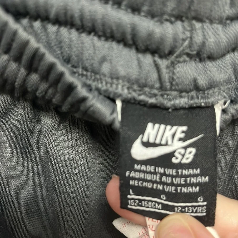 NIKE- medium gray polyester athletic shorts